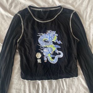 Crop top with cool dragon on it
